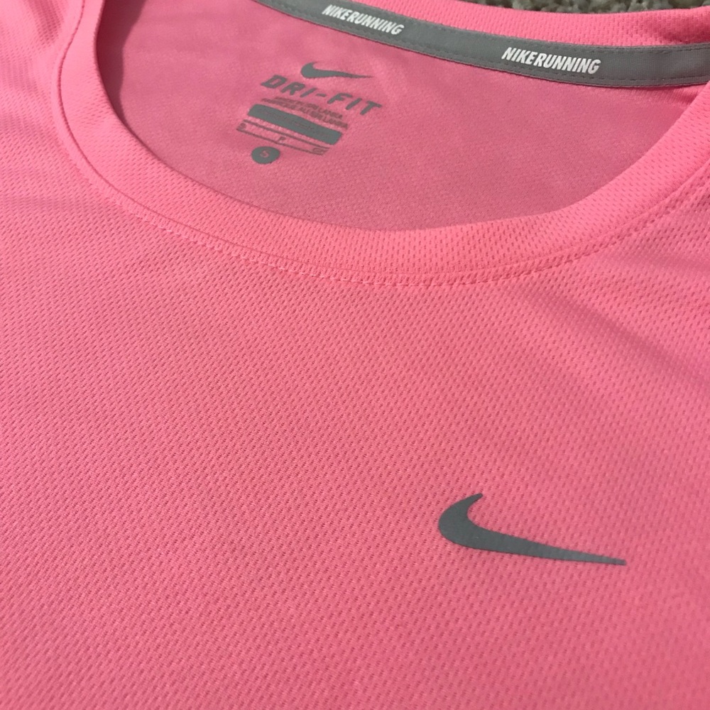 Pink Nike shirt
